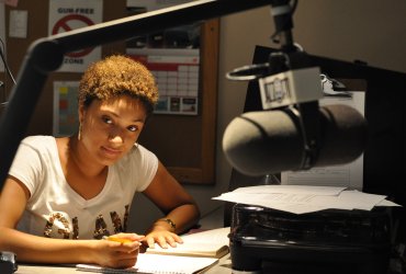 Woman working in a radio station